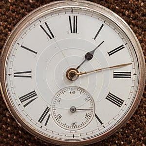 Close-up of an old sterling silver pocket watch