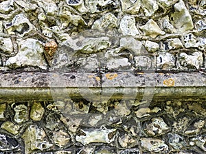 Close Up of a Old Stone Wall Stonework on a Church Building photo