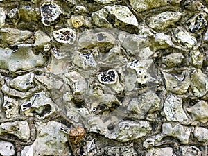 Close Up of a Old Stone Wall Stonework on a Church Building photo