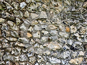 Close Up of a Old Stone Wall Stonework on a Church Building photo