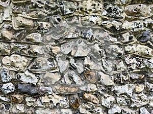 Close Up of a Old Stone Wall Stonework on a Church Building photo