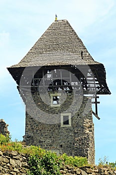 Old tower decay deterioration with its roof falling apart.