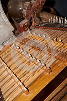 Close-up of an old traditional zither string