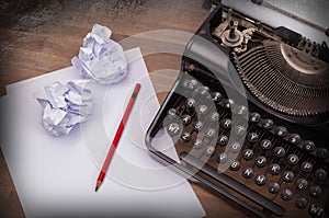 Close-up of an old typewriter with paper