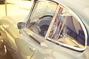 Close up on old vintage car, door and window