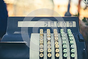 Close up of old vintage mechanical cash register