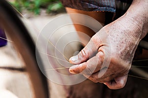 Traditional sericulture Thai silk making in Countryside, Thailand photo