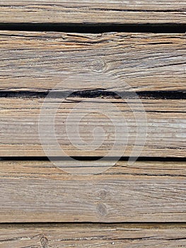 Close up of old wooden slats. Full frame of horizontal sheets of old wood. Abstract background for design and text. Natural glued
