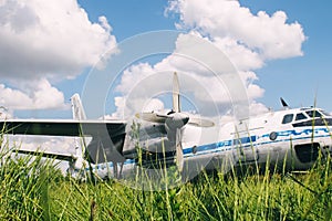 A close-up of an old wrecked passenger plane that has been decommissioned and stands for tourists. The fuselage shows traces of