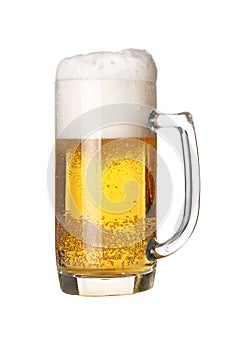 Close up one frothy beer glass isolated on white