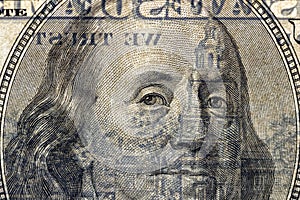 close-up of one hundred American dollars transparent in the light