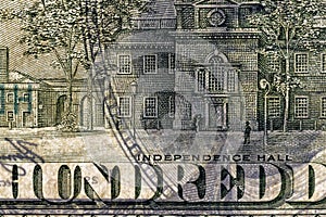 close-up of one hundred American dollars transparent in the light