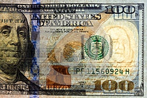 Close-up one hundred US dollar bill, top view point