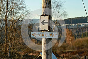 Close up on a one way sign