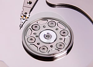 Close up of open computer hard disk tonned