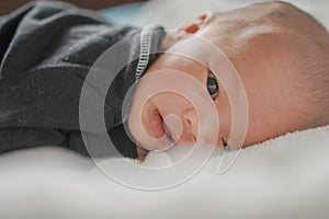 Close Up Open Eyes newborn prostrate portrait