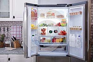 Close-up Of An Open Refrigerator photo