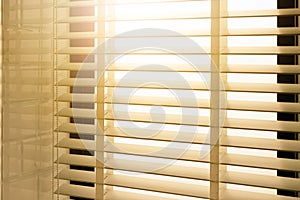 Close-up open venetian blinds. lighting range control sunlight coming from a window. decoration interior. Modern jalousie