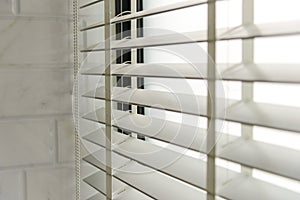 Close-up open venetian blinds. lighting range control sunlight coming from a window. decoration interior.