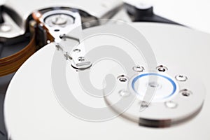 Close up of opened hard disk drive, data saving.