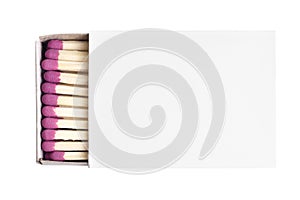 Close-up of an opened matchbox with matches isolated on white background