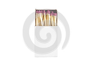Close-up of an opened matchbox with matchsticks isolated on white background