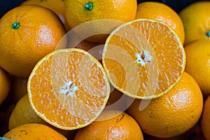 Close up of Orange cut in half for background, orange flesh.