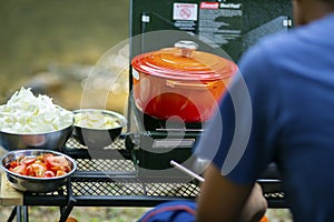 Close up of Orange enameled cast iron