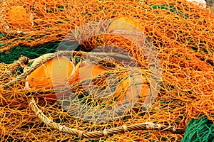 Close-up of orange fishing net.