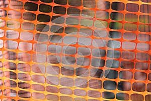 Close-up of an orange plastic mesh