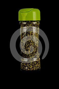 Close-up of oregan spice bottle