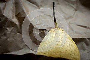 Close up of organic chinese white pear with dotted skin