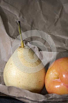 Close up of organic chinese white pear and red plum