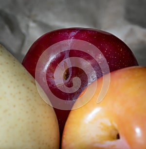 Close up of organic chinese white pear and red plum