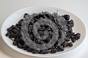 Close-up of Organic Dried Black Mulberries,healthy food concept