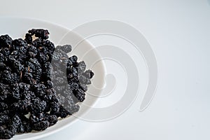 Close-up of Organic Dried Black Mulberries,healthy food concept