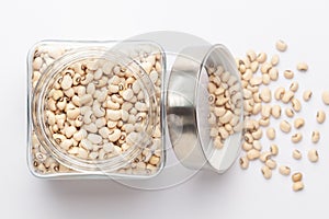 Close up of Organic soybean,  Glycine max  or soya bean dal in a glass jar with Lid.