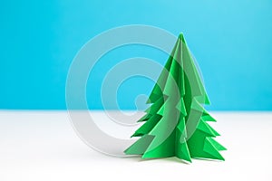 Close up of origami christmas tree. Space for copy