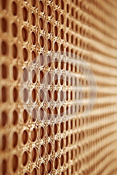 Close Up Of Ornate Circular Pattern On Honeycomb Textured Background, Shallow Depth Of Field photo