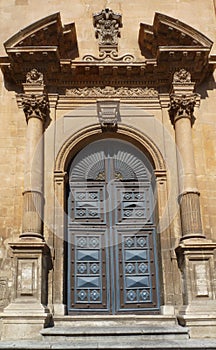 Close up of ornate doorway of St Peter`s cathedral, Modica, Sicily