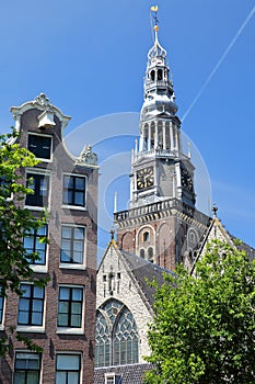 Close-up on Oude kerk church, located along Oudezijds Voorburgwal canal in Amsterdam