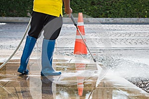 Close up Outdoor floor cleaning with high pressure water jet