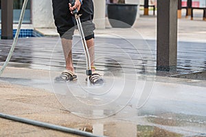 Close up Outdoor floor cleaning with high pressure water jet