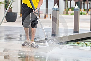 Close up Outdoor floor cleaning with high pressure water jet