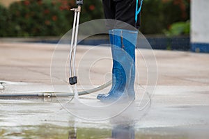 Close up Outdoor floor cleaning with high pressure water jet