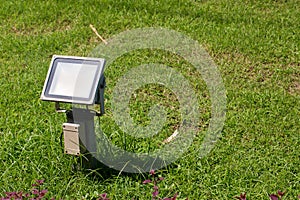 Close up outdoor LED lamp on the yard. Electrical light in the night. image for background,