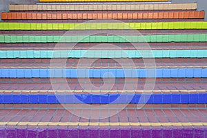 Close-up of an outdoor stairs with bricks and colorful risers in San Francisco, CA