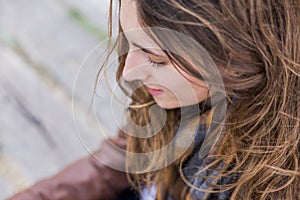 Close up outdoors portrait of a beautiful woman photo