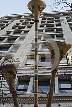 Close up of outdoor Trumpet holiday decorations at Macy`s in Chicago, 2019