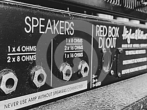Close up output Black old Amplifier.